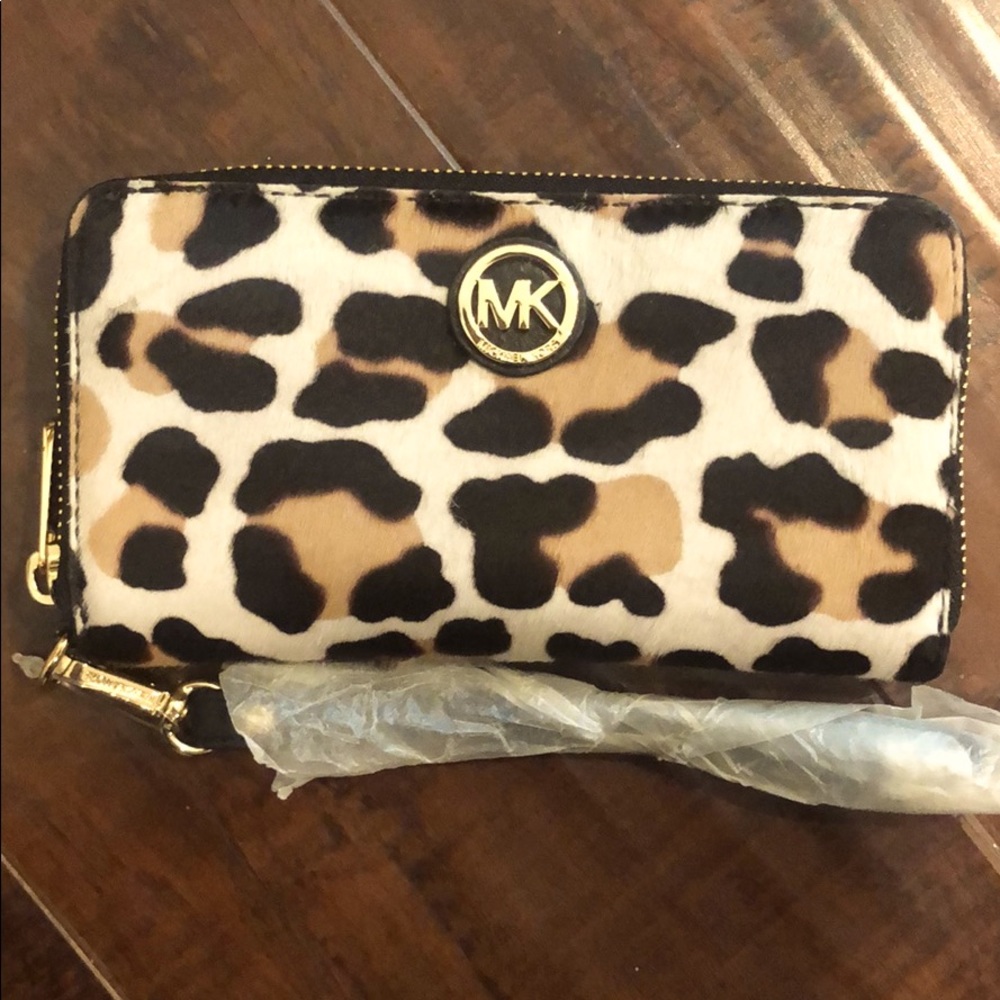 Brand new Micheal Kors Cheetah print wallet